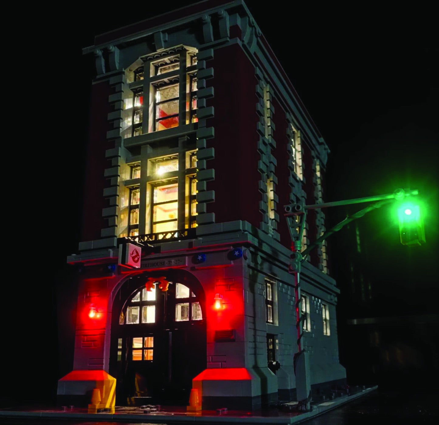 LEGO Ghostbusters Firehouse Headquarters set 75827, illuminated with the Brick Loot LED Light Kit.